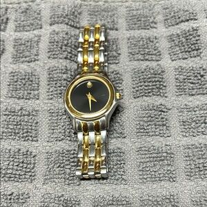 Movado Ladies Museum Watch. Stainless steel and goldtone band.